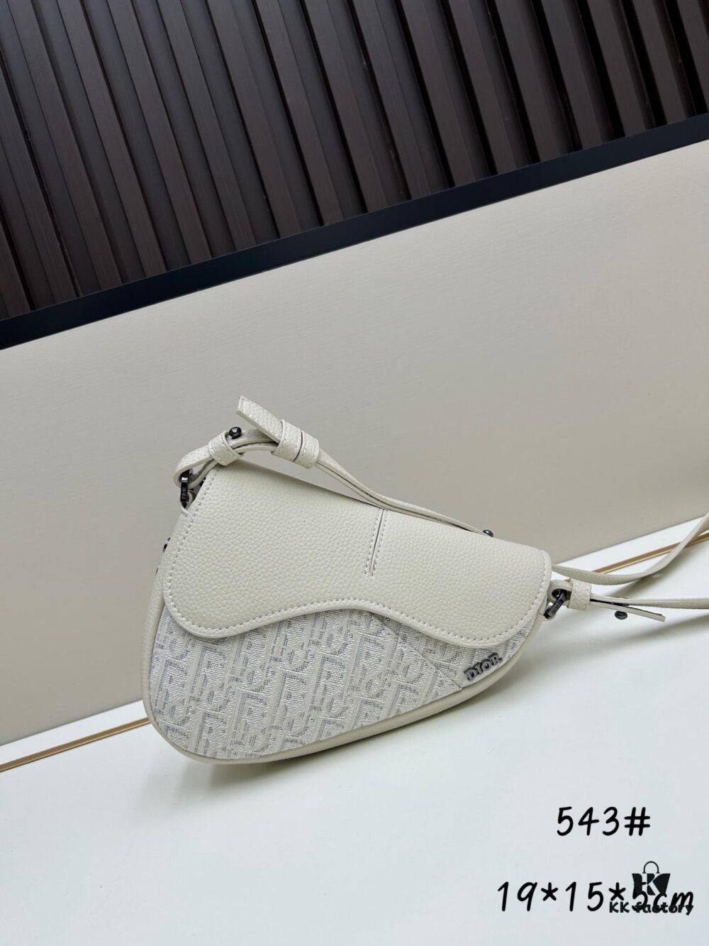 Saddle Bag Reimagined with Modern Structure in Beige and Black Oblique Print