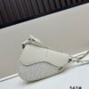 69309d116e68136f4d9ab15a Saddle Bag with Modern Structure in Beige and Black Oblique Print