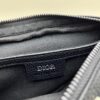 69309d116e68136f4d9ab15b This saddle bag reinterprets the classic design with a modern structure. Crafted from beige and black Oblique printed fabric, it features a signature black grained cowhide leather magnetic flap and a concealed zip closure. The interior includes a large compartment and slip pockets for daily essentials. The mini style comes with an adjustable, detachable leather shoulder strap, allowing versatile wear as a top handle, shoulder bag, or crossbody.