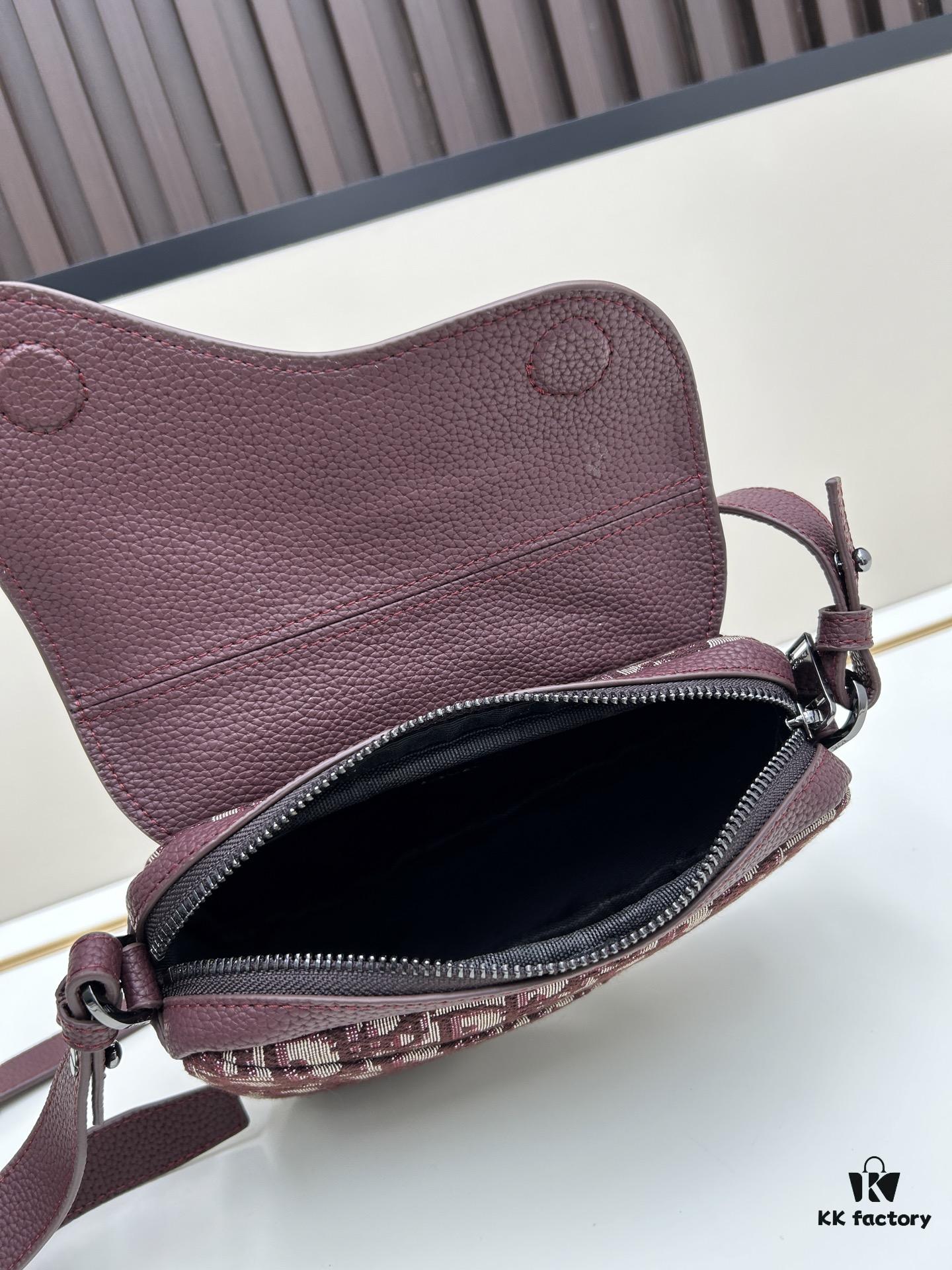 69309d136e68136f4d9ab160 This saddle bag reinterprets the classic design with a modern structure. Crafted from beige and black Oblique printed fabric, it features a signature grained black calfskin magnetic flap and hidden zip closure. The interior includes a spacious compartment and slip pocket for daily essentials. The mini style comes with an adjustable, detachable leather shoulder strap, allowing for handheld, shoulder, or crossbody wear.