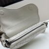 69309d196e68136f4d9ab166 Saddle Bag Reimagined with Modern Structure in Beige and Black Oblique Print