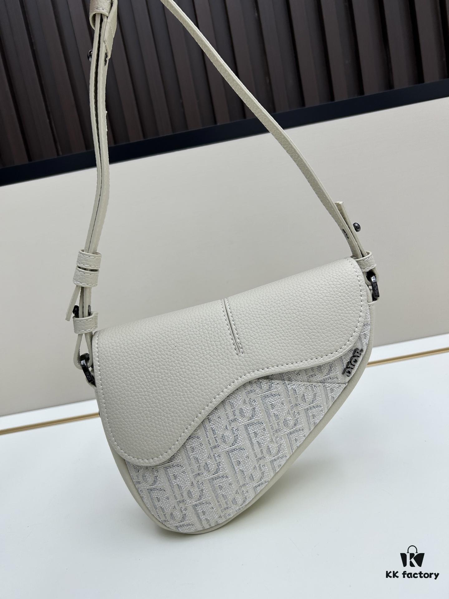 69309d1b6e68136f4d9ab16a Saddle Bag Reimagined with Modern Structure in Beige and Black Oblique Print