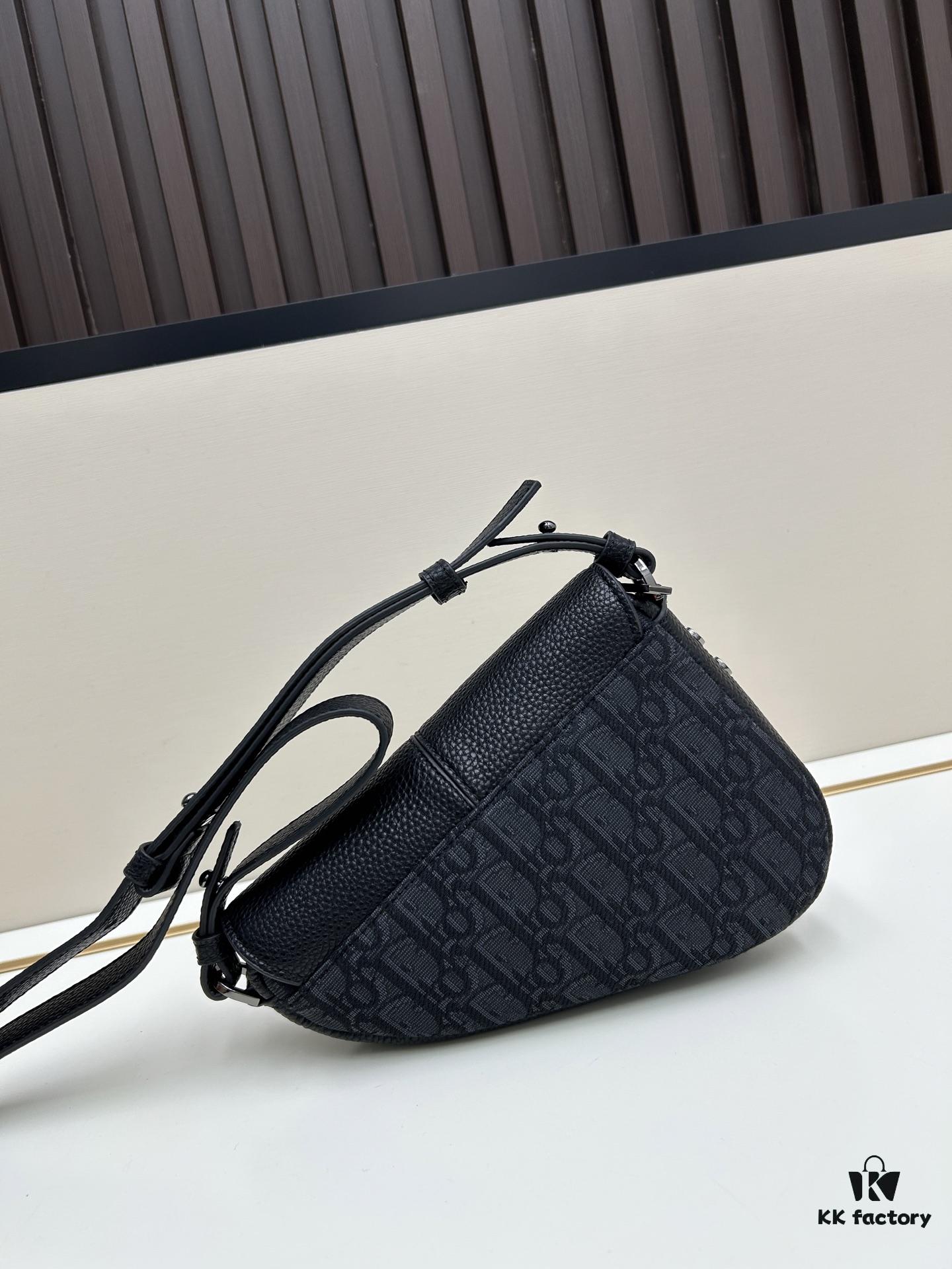 69309d206e68136f4d9ab16f This saddle bag reinterprets the classic design with a modern structure. Crafted from beige and black Oblique printed fabric, it features a signature black grained calfskin magnetic flap and a concealed zip closure. The interior includes a large compartment and slip pockets for organizing daily essentials. This mini style comes with an adjustable and detachable leather shoulder strap, allowing for versatile wear as a handheld, shoulder, or crossbody bag.
