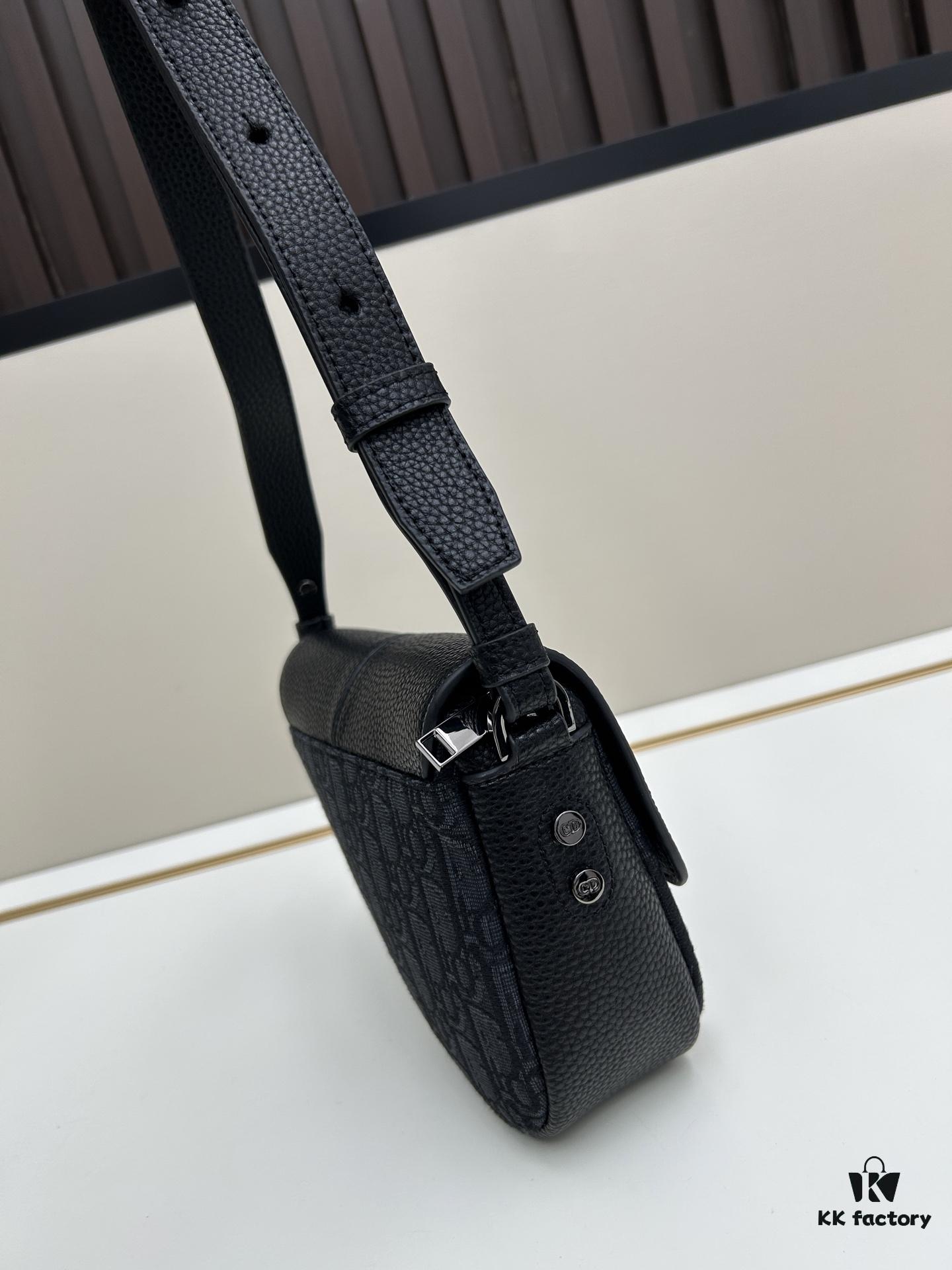 69309d206e68136f4d9ab170 This saddle bag reinterprets the classic design with a modern structure. Crafted from beige and black Oblique printed fabric, it features a signature black grained calfskin magnetic flap and a concealed zip closure. The interior includes a large compartment and slip pockets for organizing daily essentials. This mini style comes with an adjustable and detachable leather shoulder strap, allowing for versatile wear as a handheld, shoulder, or crossbody bag.