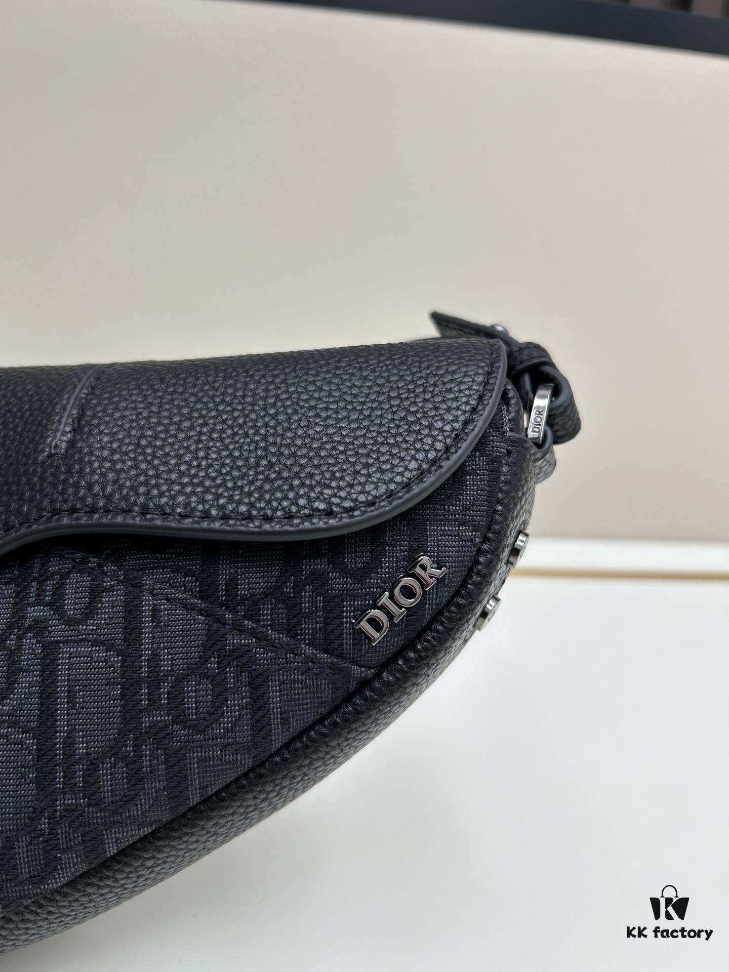 69309d216e68136f4d9ab171 This saddle bag reinterprets the classic design with a modern structure. Crafted from beige and black Oblique printed fabric, it features a signature black grained calfskin magnetic flap and a concealed zip closure. The interior includes a large compartment and slip pockets for organizing daily essentials. This mini style comes with an adjustable and detachable leather shoulder strap, allowing for versatile wear as a handheld, shoulder, or crossbody bag.