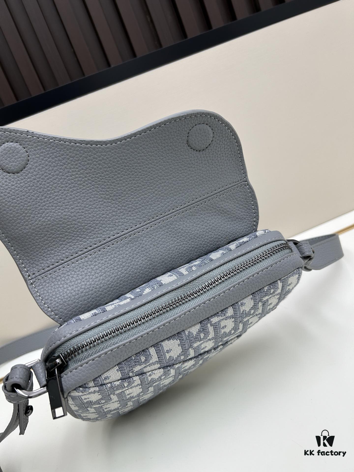 69309d236e68136f4d9ab173 This saddle bag reinterprets the classic design with a modern structure. Crafted from beige and black Oblique print fabric, it features a signature black grained calfskin magnetic flap and a concealed zip closure. The interior includes a large compartment and slip pockets for organizing daily essentials. The mini style comes with an adjustable, detachable leather shoulder strap, allowing for handheld, shoulder, or crossbody wear.