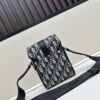 69309d8d6e68136f4d9ab218 Dior Hit The Road Summer 2025 Men's Vertical Flip Messenger Bag in Black Oblique Print