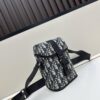 69309d8d6e68136f4d9ab219 Dior Hit The Road Summer 2025 Men's Vertical Flip Messenger Bag in Black Oblique Print