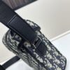 69309d926e68136f4d9ab21d Dior Hit The Road Summer 2025 Men's Vertical Flip Messenger Bag in Black Oblique Print