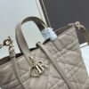 69309dc56e68136f4d9ab271 Medium and Small Dior Toujours Vertical Handbag in Soft Raspberry Beige Calfskin with Cannage Stitching