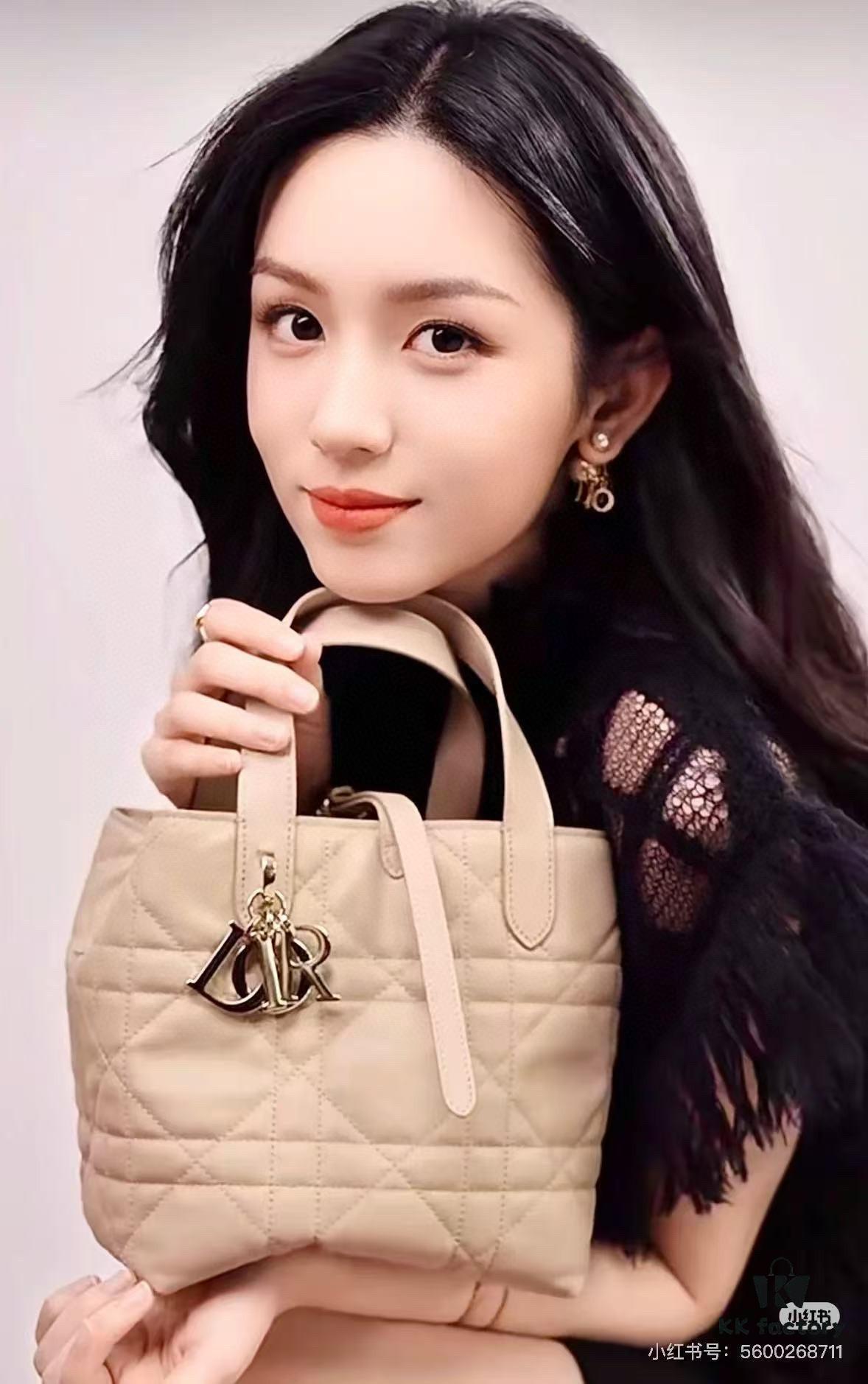 69309dcc6e68136f4d9ab27c Dior Toujours Vertical Handbag in Soft Raspberry Calfskin with Large Cannage Stitching