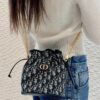 69309e3a6e68136f4d9ab32b Dior Jolie Bucket Bag in Black Calfskin with Cannage Stitching, 2025 New Arrival