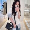 69309e7a6e68136f4d9ab3a0 Dior Toujours Vertical Handbag in Blush Beige Calfskin Leather with Cannage Stitching