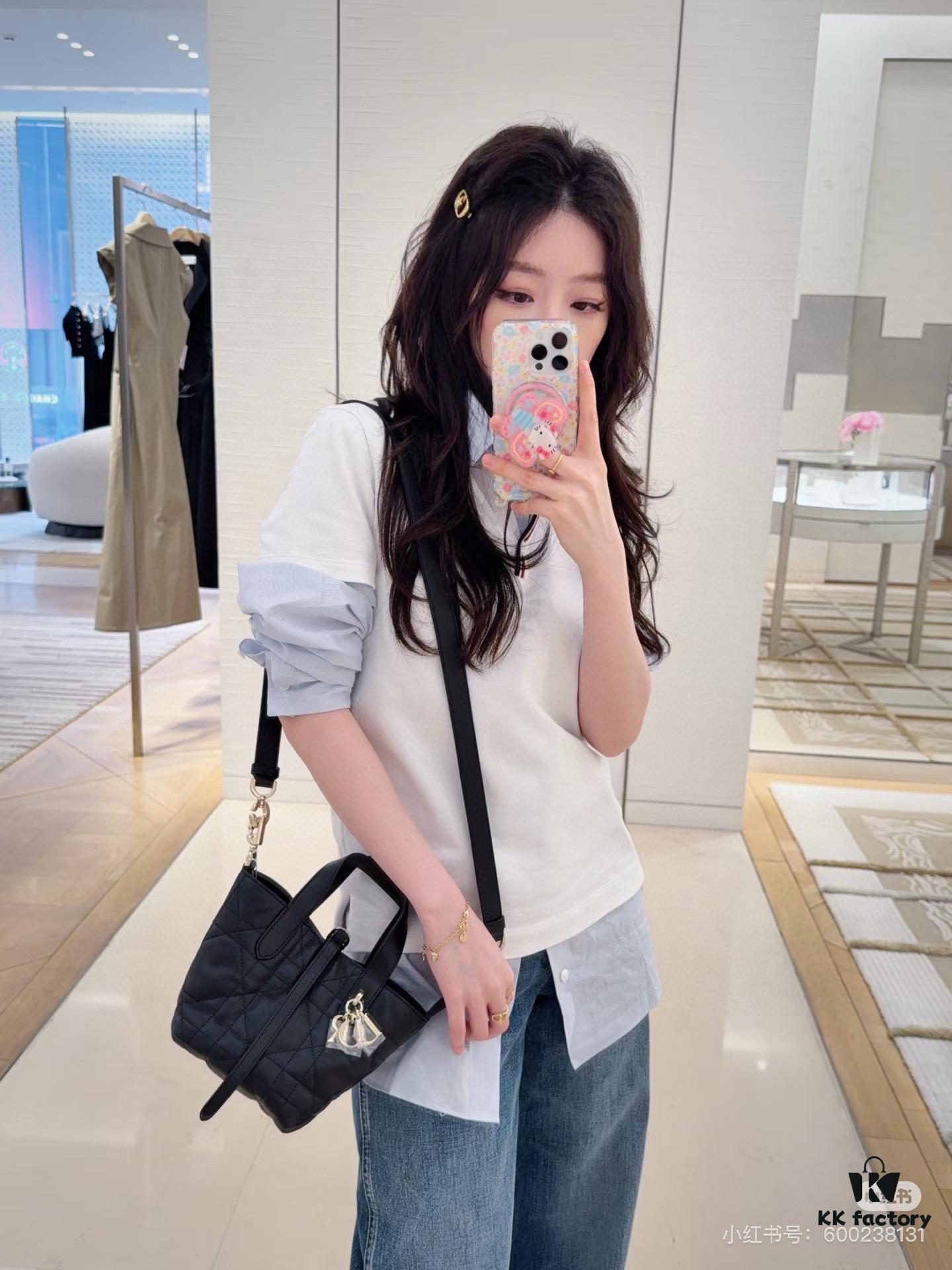 69309e7a6e68136f4d9ab3a0 Dior Toujours Vertical Handbag in Blush Beige Calfskin Leather with Cannage Stitching