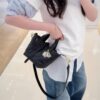69309e7b6e68136f4d9ab3a3 Dior Toujours Vertical Handbag in Blush Beige Calfskin Leather with Cannage Stitching