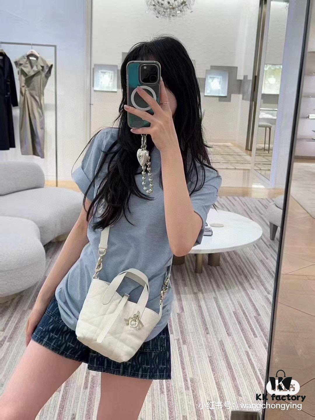 69309e7c6e68136f4d9ab3a5 Dior Toujours Vertical Handbag in Blush Beige Calfskin Leather with Cannage Stitching