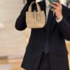 69309e7e6e68136f4d9ab3aa Dior Toujours Vertical Handbag in Blush Beige Calfskin Leather with Cannage Stitching