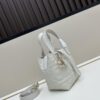 69309e896e68136f4d9ab3bb Dior Toujours Vertical Handbag in Blush Beige Calfskin with Quilted Diamond Stitching
