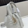 69309e896e68136f4d9ab3bd Dior Toujours Vertical Handbag in Blush Beige Calfskin with Quilted Diamond Stitching