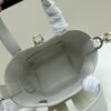 69309e8a6e68136f4d9ab3bf Dior Toujours Vertical Handbag in Blush Beige Calfskin with Quilted Diamond Stitching