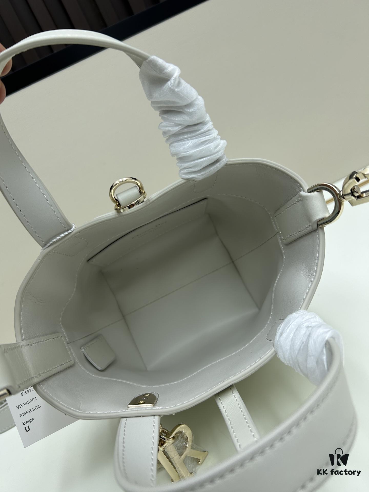 69309e8a6e68136f4d9ab3bf Dior Toujours Vertical Handbag in Blush Beige Calfskin with Quilted Diamond Stitching