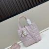 69309e8d6e68136f4d9ab3c3 Dior Toujours Vertical Handbag in Blush Beige Calfskin Leather with Quilted Diamond Stitching