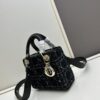 6930a0536e68136f4d9ab6fb Ilady dio.r Black Canvas and Leather Handbag with Adjustable Strap
