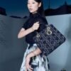 6930a0a66e68136f4d9ab79d Ilady Dio.r Coarse Houndstooth Black Canvas and Leather Handbag with Adjustable Strap