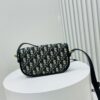 6930a0ba6e68136f4d9ab7c7 Latest Dior Bobby Vintage Canvas Bag with Adjustable Strap