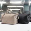 Weekender 25 Handbag in Elegantly Designed Beige Calfskin with Dior Gravity Embossed Pattern