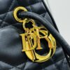 6930a4136e68136f4d9abec7 Dior Nolita Medium Bag in Black Lambskin with Cannage Quilting