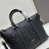 6930a4826e68136f4d9abfa7 Weekender 25 Handbag in Embossed Calfskin with Dior Gravity Print