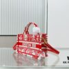 6930a49c6e68136f4d9abfd8 Dior Book Tote24 Mini with Adjustable Strap, Red Sun Head Design