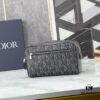 6930a7146e68136f4d9ac45d This toiletry bag combines practical functionality with minimalist design. Crafted from black CD Diamond canvas inspired by the Dior archives, it features smooth calf leather trims in matching tones and a signature Dior emblem on the front.