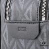 6930a7166e68136f4d9ac461 This toiletry bag combines practical functionality with minimalist design. Crafted from black CD Diamond canvas inspired by the Dior archives, it features smooth calf leather trims in matching tones and a signature Dior emblem on the front.