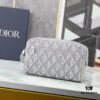 6930a7196e68136f4d9ac465 This toiletry bag combines practical functionality with minimalist design. Crafted from Dior gray CD Diamond canvas inspired by the Dior archives, it features smooth calf leather trims in matching tones and a signature Dior logo on the front.