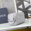6930a7196e68136f4d9ac467 This toiletry bag combines practical functionality with minimalist design. Crafted from Dior gray CD Diamond canvas inspired by the Dior archives, it features smooth calf leather trims in matching tones and a signature Dior logo on the front.
