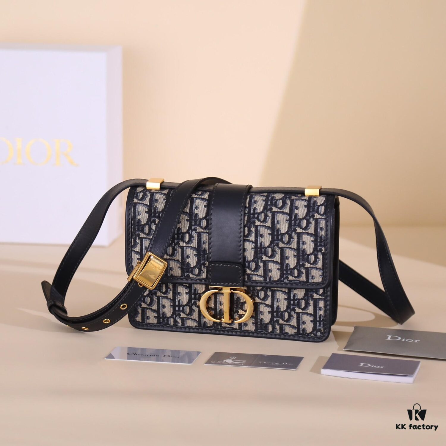 6930a7386e68136f4d9ac4a6 30 Montaigne Handbag in Blue Oblique Print Fabric