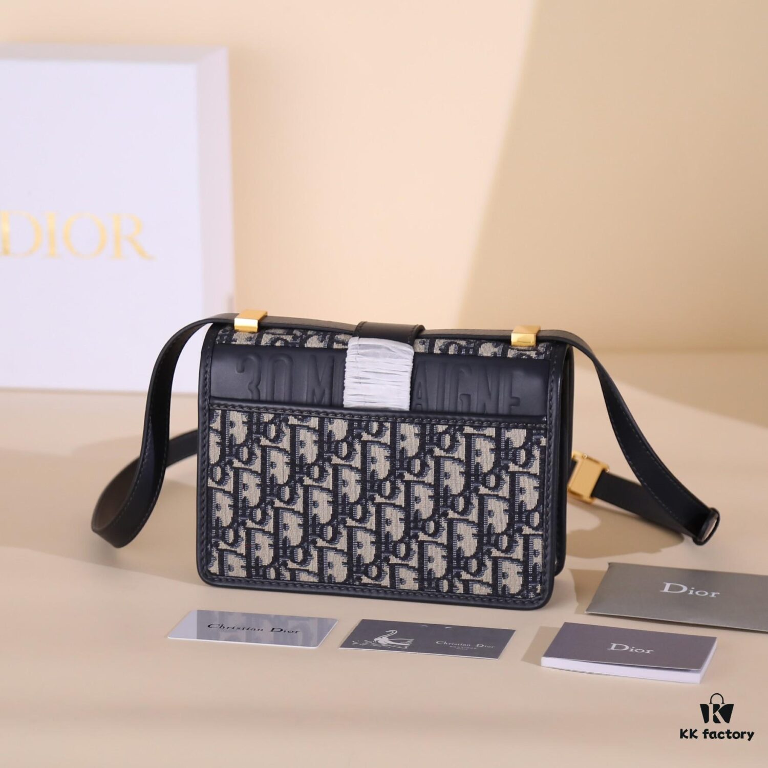 6930a7396e68136f4d9ac4a7 30 Montaigne Handbag in Blue Oblique Print Fabric