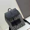 6930aa526e68136f4d9acaed Elegant Motion Backpack in Beige and Black Oblique Print