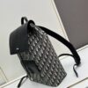 6930aa526e68136f4d9acaee Elegant Motion Backpack in Beige and Black Oblique Print