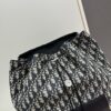 6930aa536e68136f4d9acaf2 Elegant Motion Backpack in Beige and Black Oblique Print