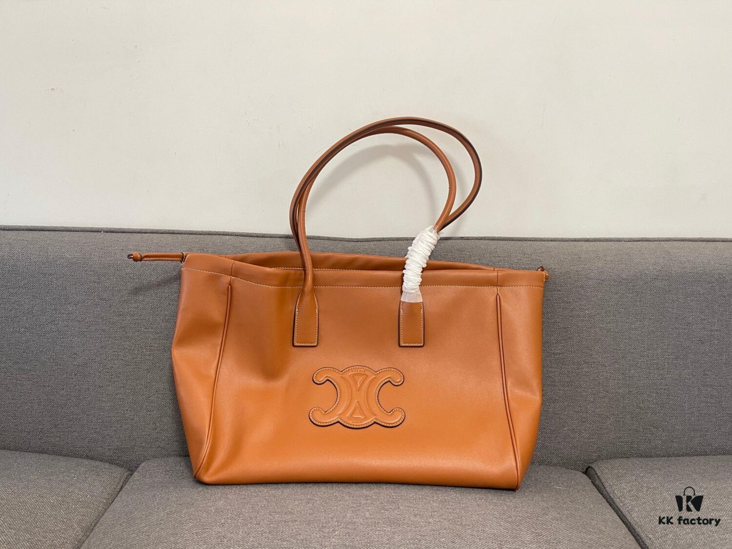 6930abb76e68136f4d9acd54 CELINE CABAS TRIOMPHE Large Drawstring Tote Bag in Soft Leather