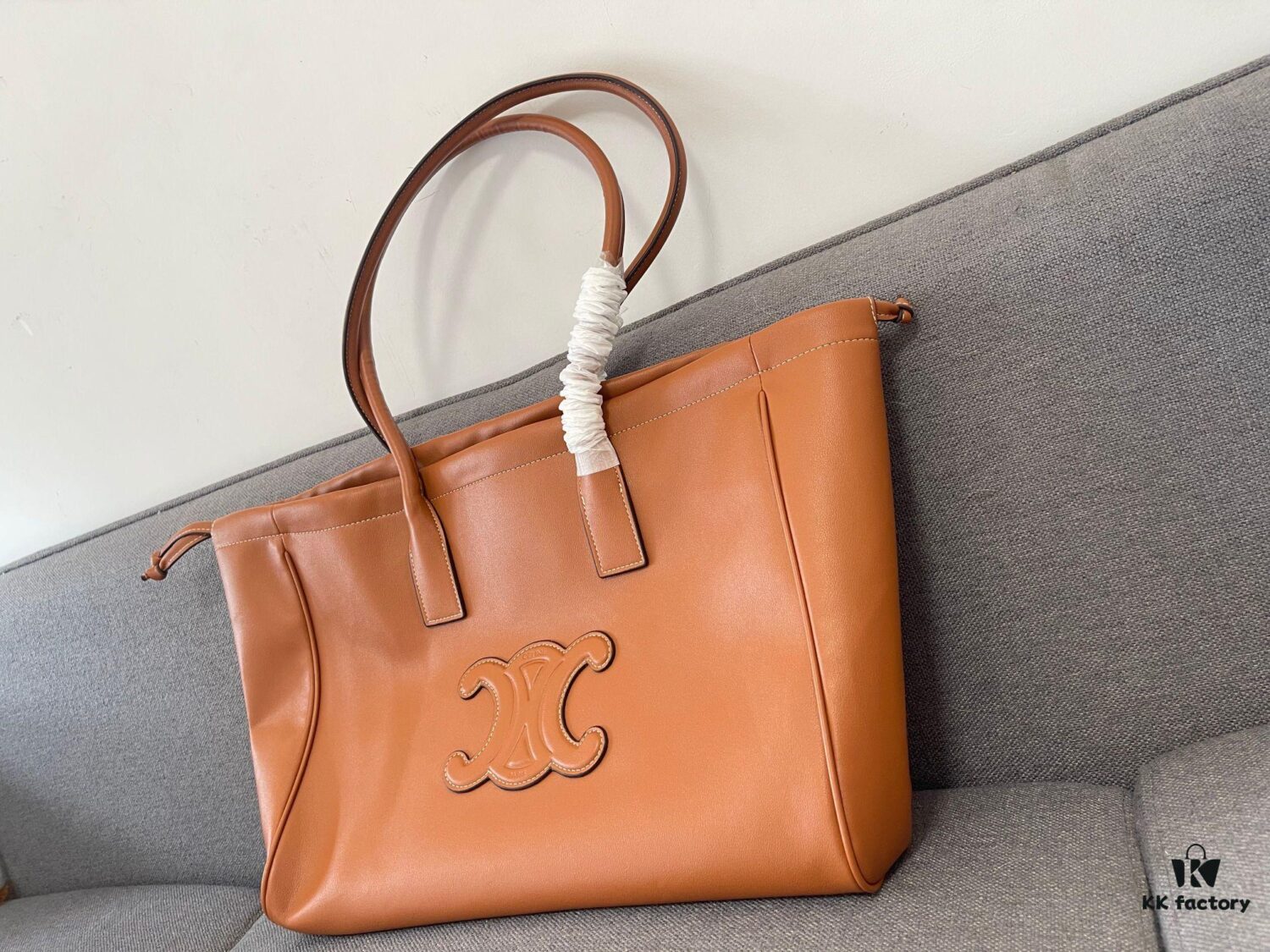 6930abb86e68136f4d9acd57 CELINE CABAS TRIOMPHE Large Drawstring Tote Bag in Soft Leather