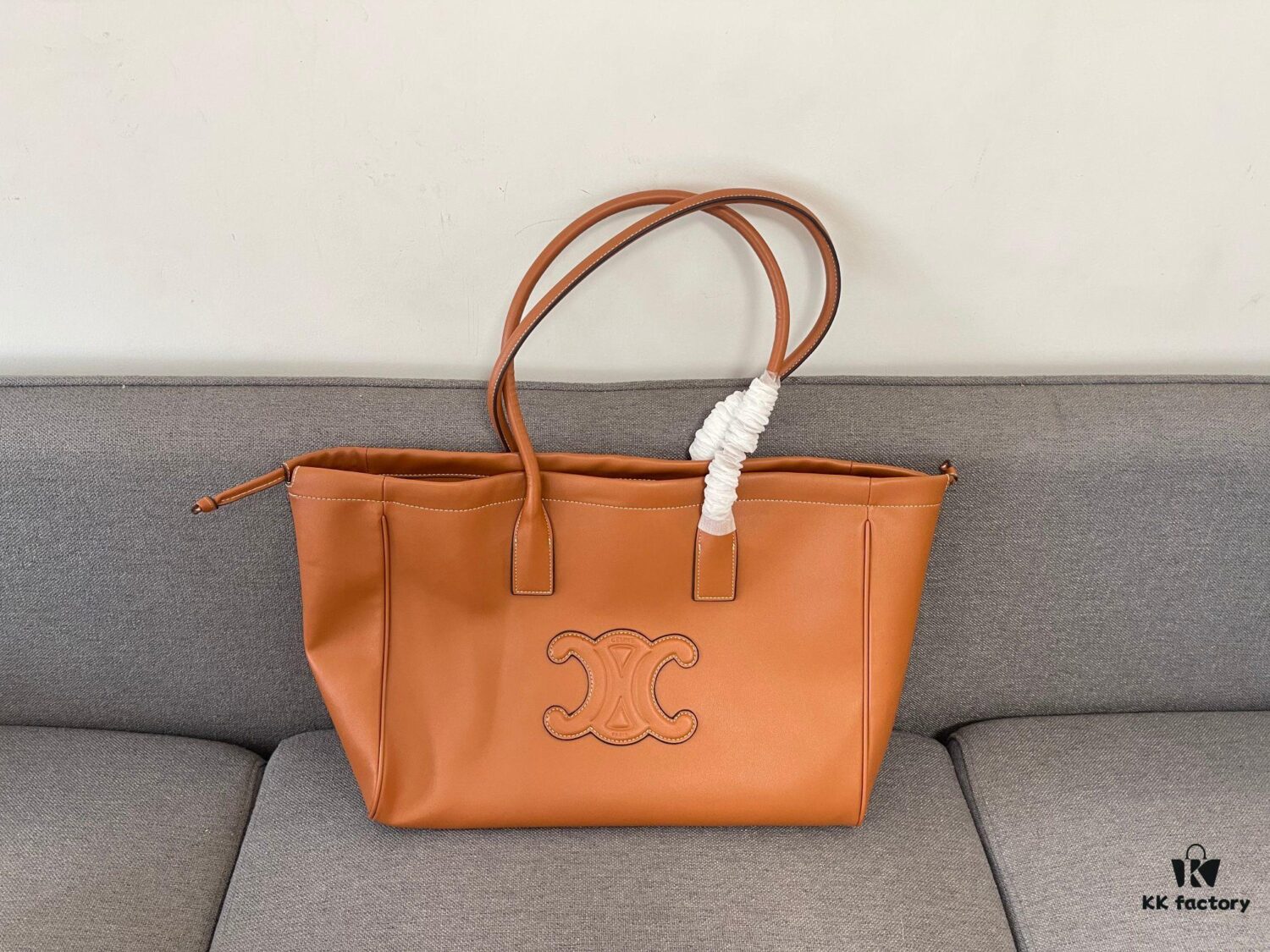 6930abb86e68136f4d9acd58 CELINE CABAS TRIOMPHE Large Drawstring Tote Bag in Soft Leather