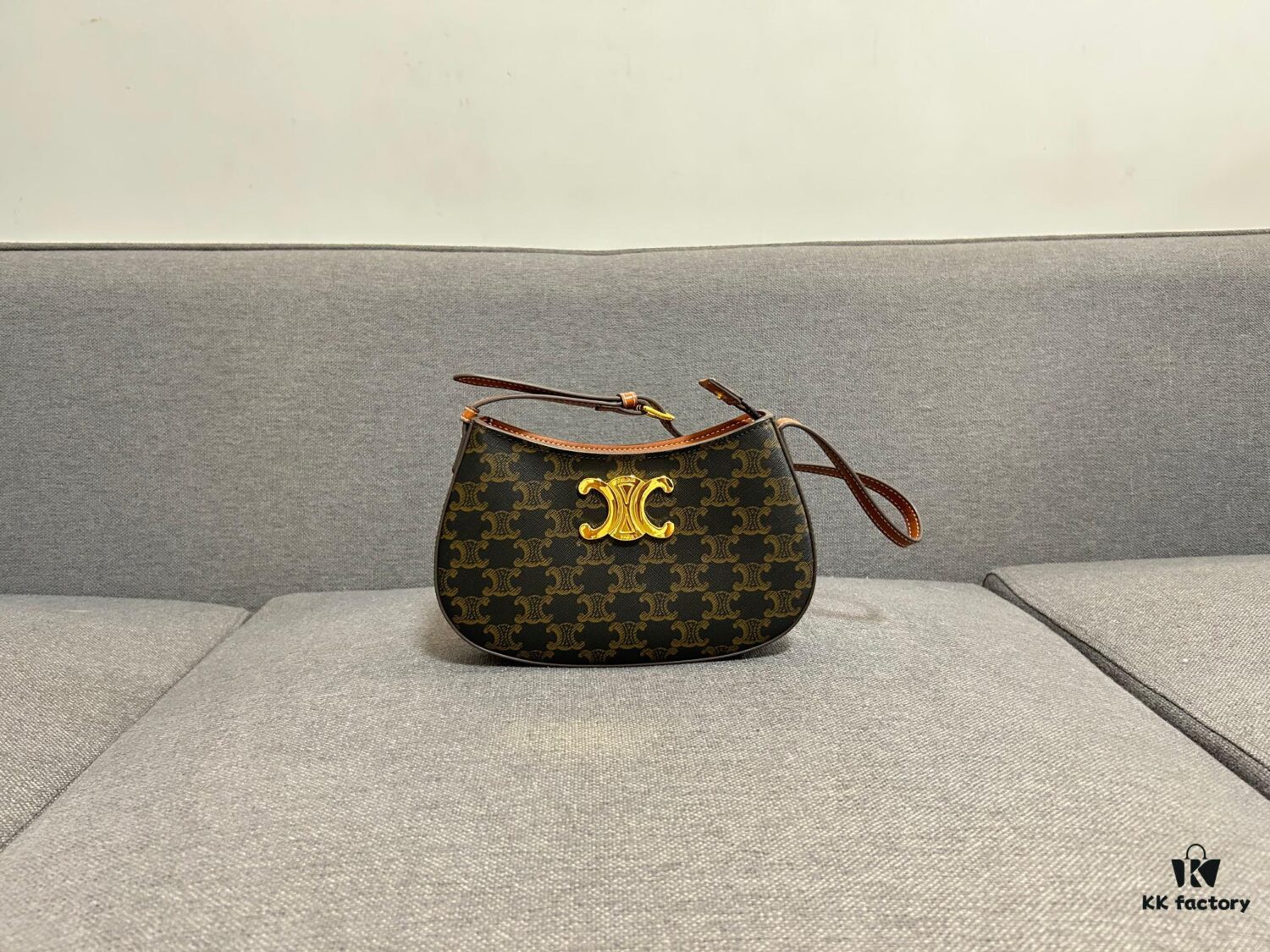 6930abf66e68136f4d9acdbe CELINE Triumph Arch TILLY Logo-Print Leather Handbag
