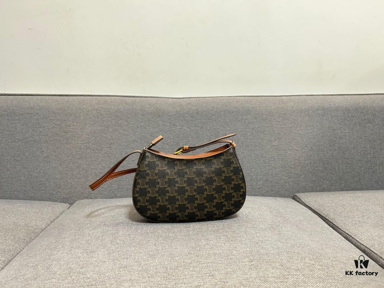 6930abf76e68136f4d9acdbf CELINE Triumph Arch TILLY Logo-Print Leather Handbag