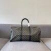 6930ac4a6e68136f4d9ace48 Celine Vintage Travel Bag – Timeless Archlight Monogram Design with Lightweight, Spacious Build