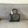 6930ac7f6e68136f4d9acea3 Celine Arc Triomphe Small Boston Pillow Bag in Leather and Fabric Materials