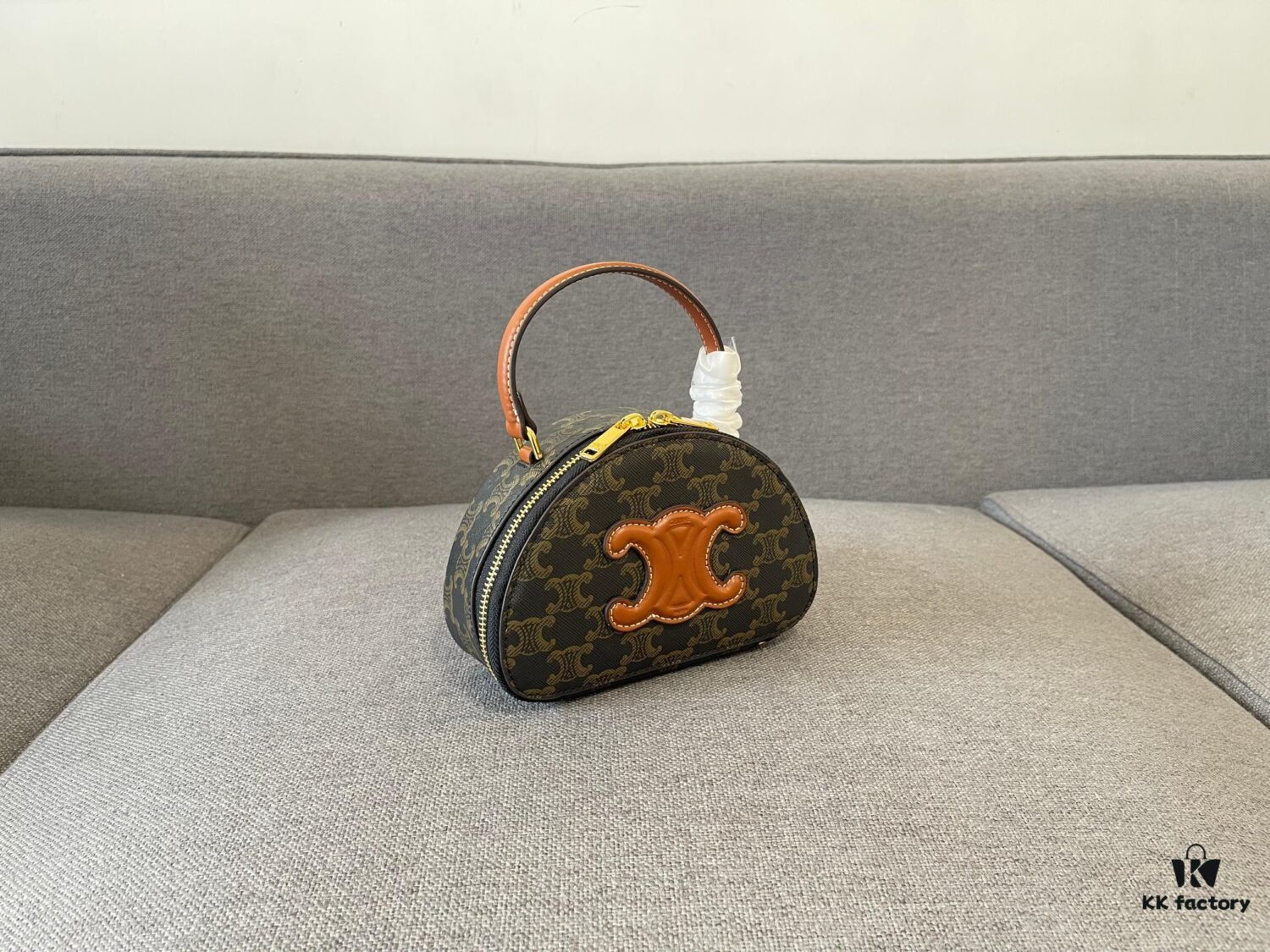 6930ac9e6e68136f4d9aced4 Celine New Logo Print Half-Moon Mini Bag